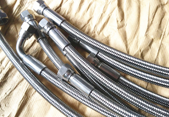 Stainless steel braided teflon hose assemblies